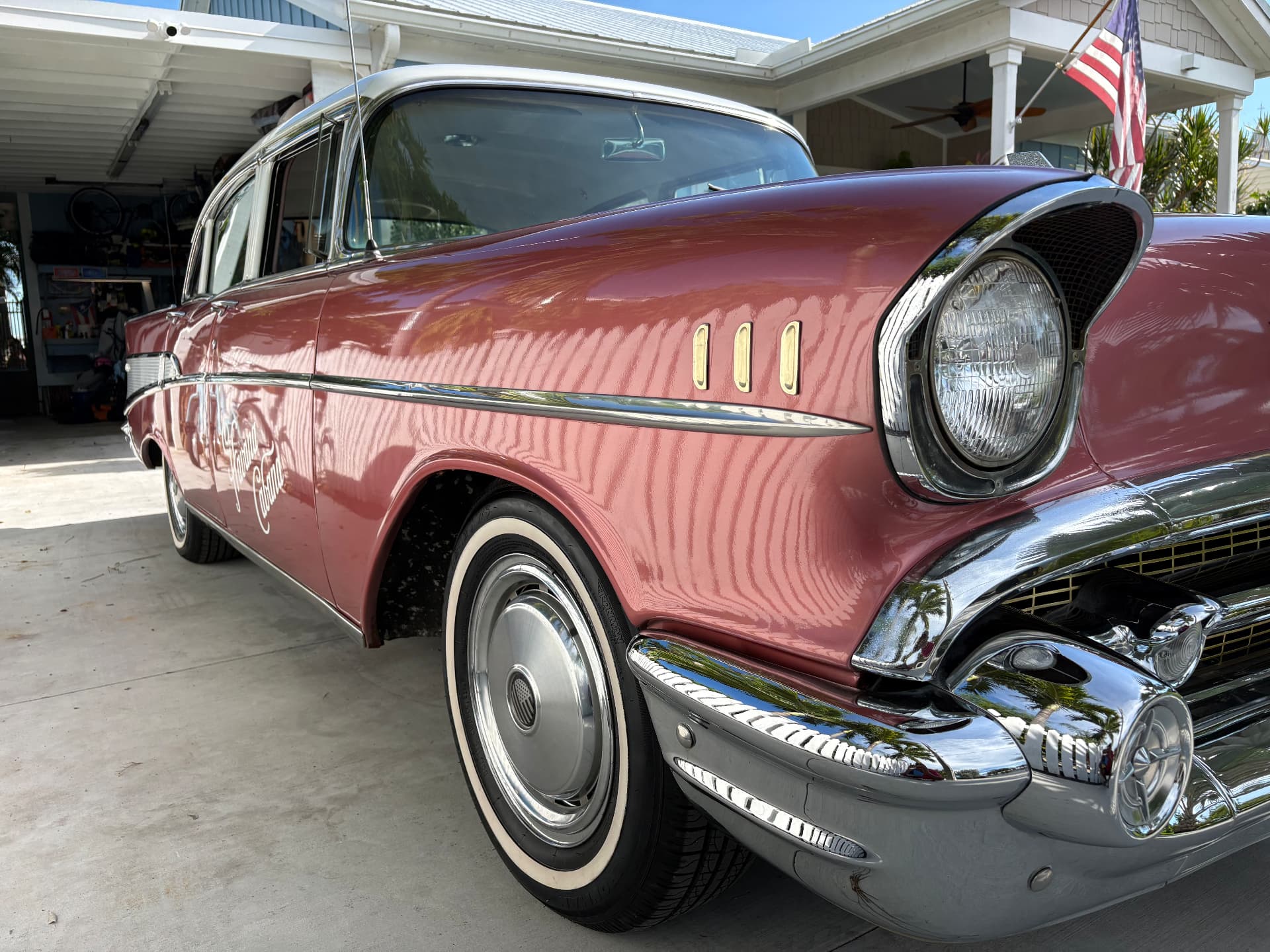 Close view of the chrome and front quarter of a classic car